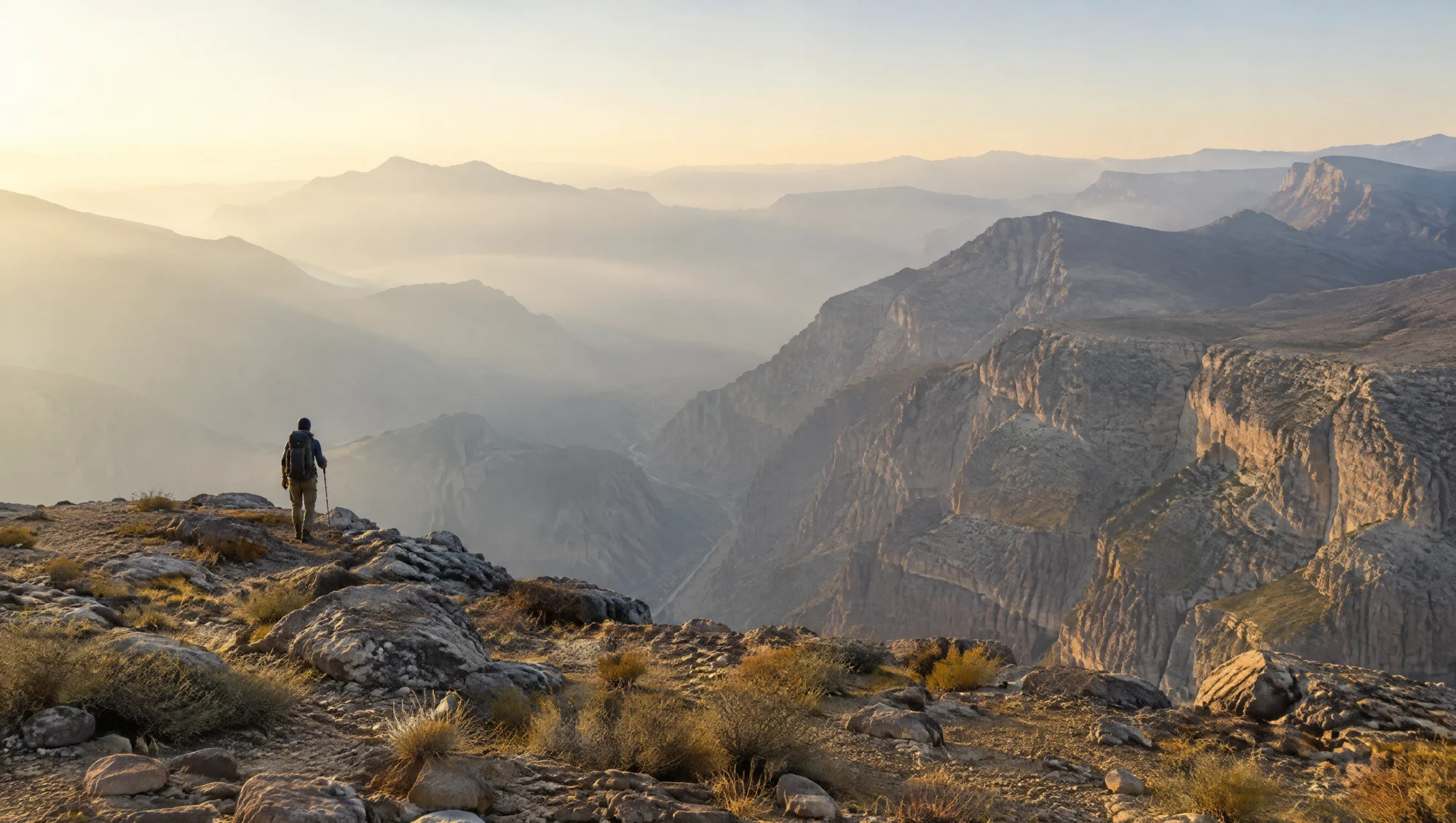 Hiker above mountain canyons in the UAE
